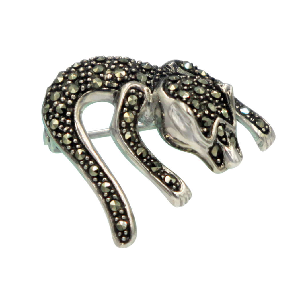 Sterling silver creative piece of brooch of an imaginary lizard.