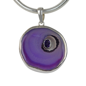 Round Purple Agate has a beautiful faceted Amethyst stone set inside the natural hollow of the agate