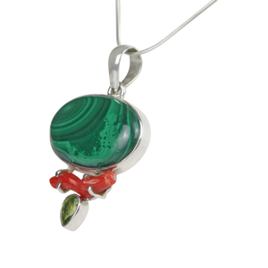 Pretty Oval shaped Malachite  Accent with a Red Coral Branch and a Beautiful Faceted Peridot