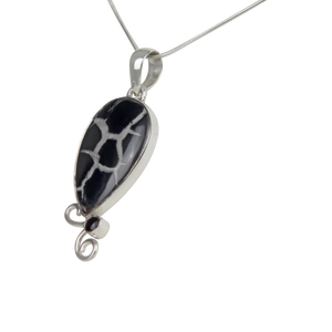 Teardrop shaped Septarian Gronate  Pendant Accents with a Smoky Quartz on Silver Work