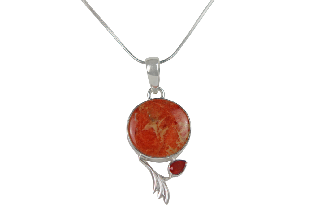 This beautiful orange colour round Sponge Coral pendant is set in an open back bazel.