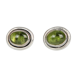 Large oval gemstone stud earrings with a sterling silver surround