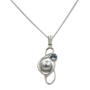 Large Pearl Swirly Pendant with an accent gemstone