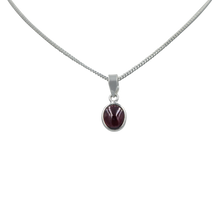 Load image into Gallery viewer, Slight oval simple cabochon Garnet set on a thin bezel setting
