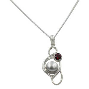 Large Pearl Swirly Pendant with an accent gemstone