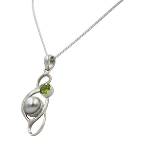 Large Pearl Swirly Pendant with an accent gemstone