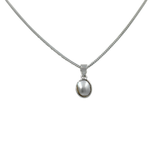 Load image into Gallery viewer, Slight oval simple fresh water Pearl set on a thin bezel setting
